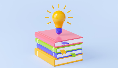 Bright idea bulb on top of books